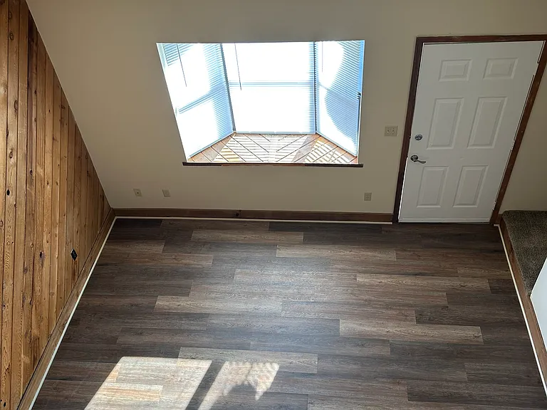 Loft bedroom overlooking living room
