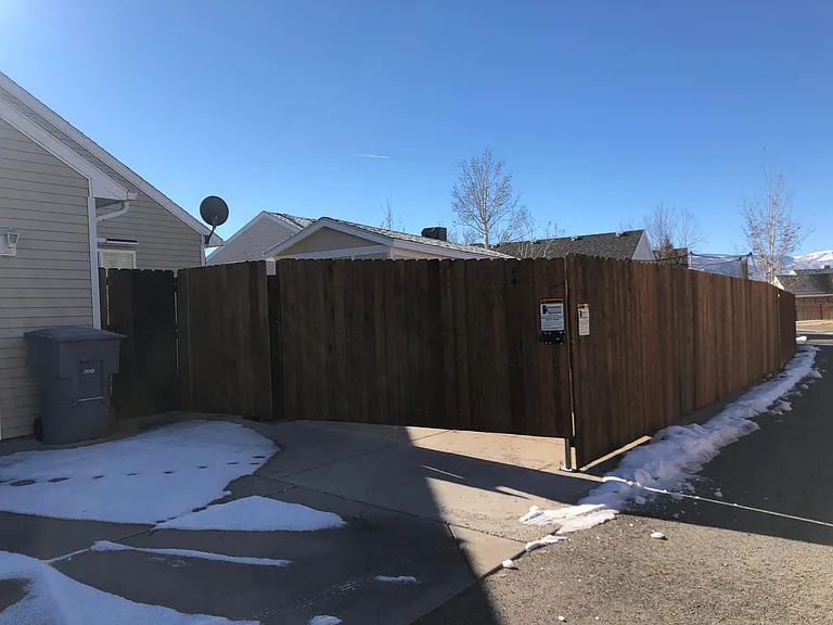 Remote-operated, solar-powered drive gate.