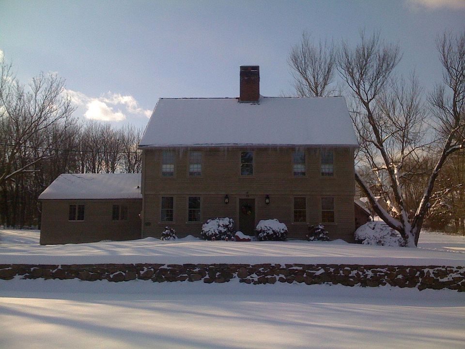 Classic New England Colonial in winter