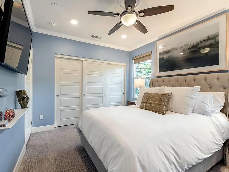Welcome to the second bedroom also located on the lowest level. Comfort, peacefulness, and calm were the design concept for this room. Every bedroom features its own high definition television with full DirecTV access.
