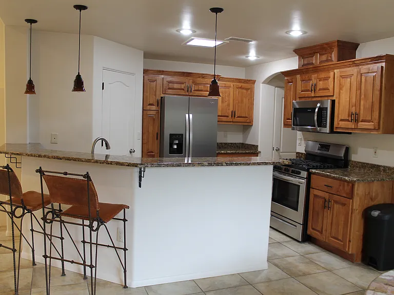 Kitchen with breakfast bar and great storage.