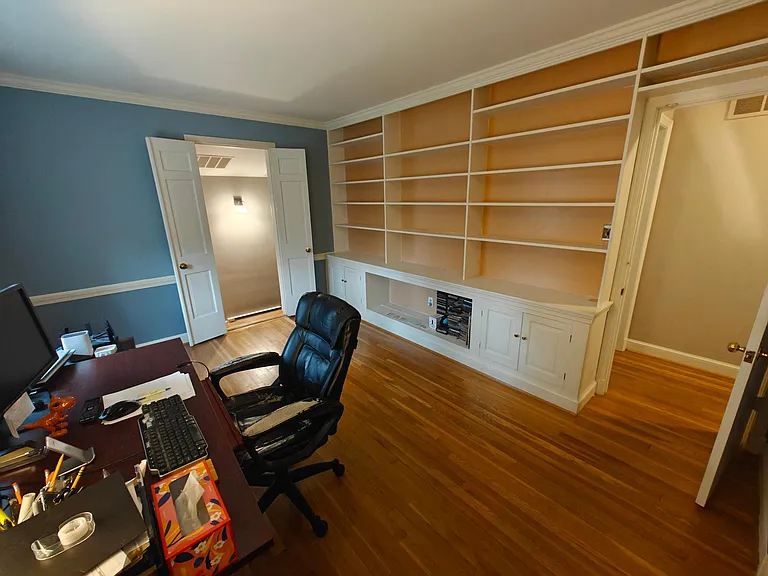 Large Office connects smaller bedrooms 3 and 4 to master bedroom and hall to mudroom/garage.