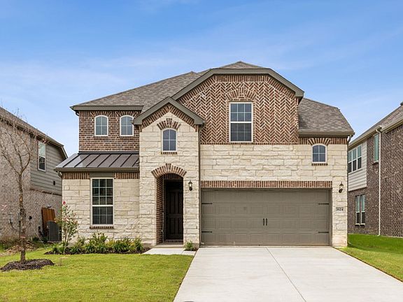 The Riverdale, a two-story home with 2-car garage, shown as Home Exterior I