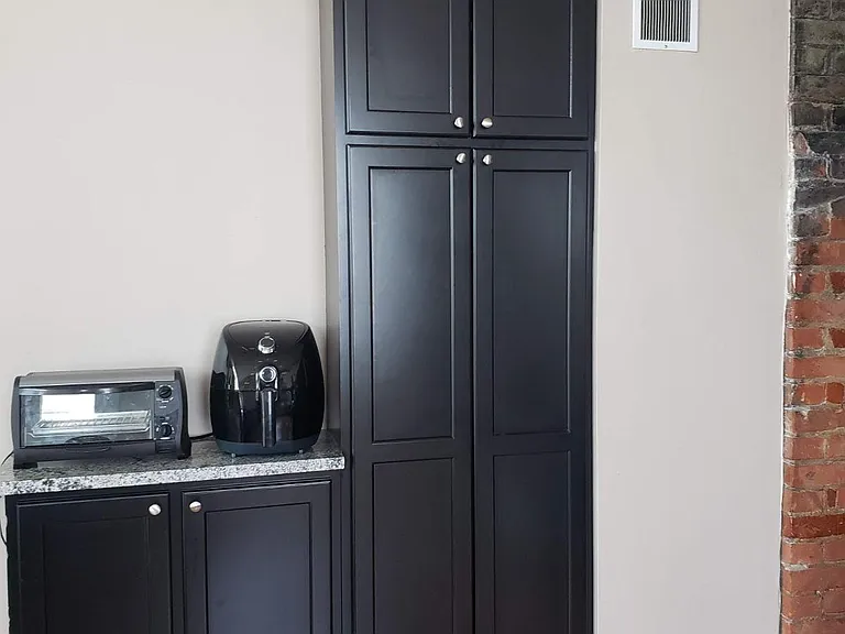 Extra kitchen cabinets for storage and small appliances
