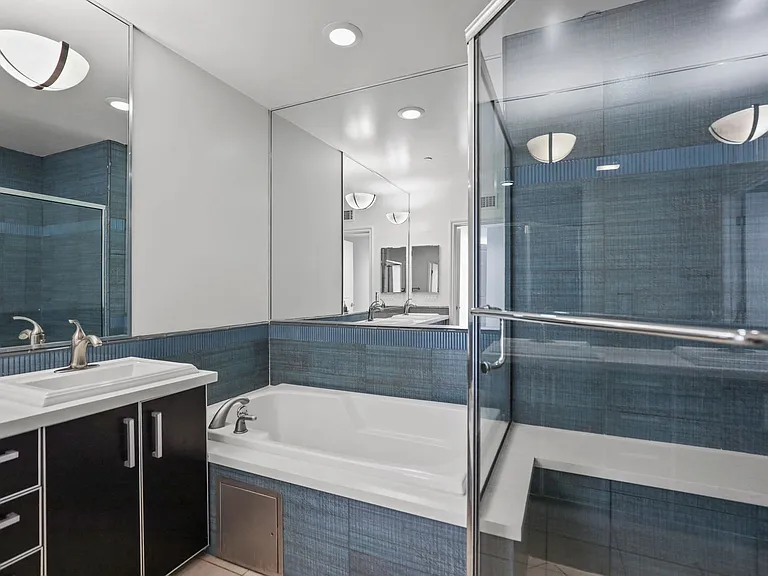 Bathroom with Bathtub and Stand-Up Shower