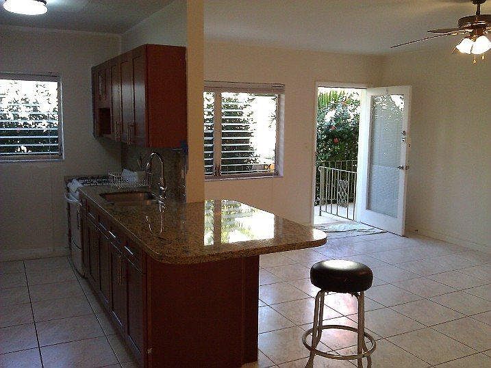 partial kitchen and partial living room