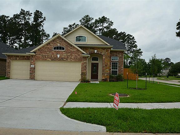 Stunning new CastleRock Communities Homes with three Car Garages with car garage openers, Stone Elevation, on a Corner Cul De Sac lot and no one behind you but the trees and lake!