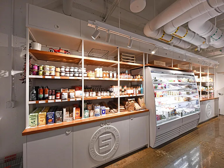 Redeveloped historic building featuring restaurants like Amelia's Bread, Barista Parlor, and Cafe Patachou. Features retail and fitness shops like Grounded Plant & Floral Co., Myriad + Fitness, and St'artup317. Only 1 mile from The Block.