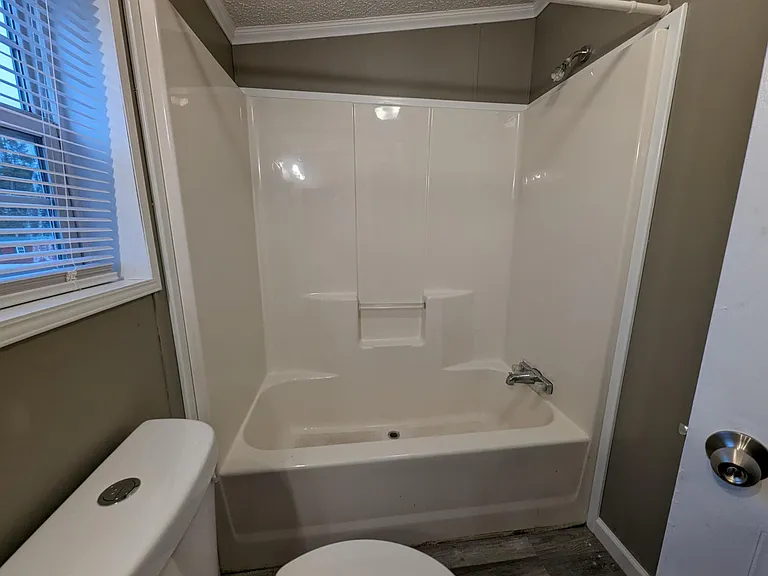 Full bathtub in common bathroom