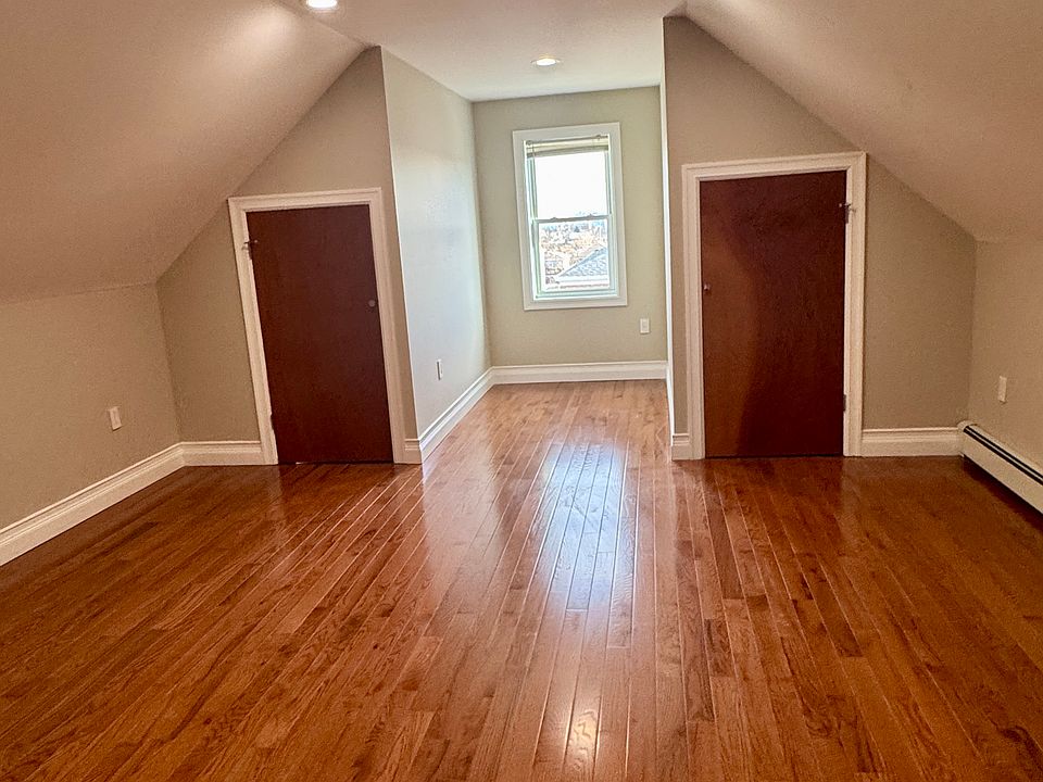 One of the bedrooms upstairs with plenty of storage space