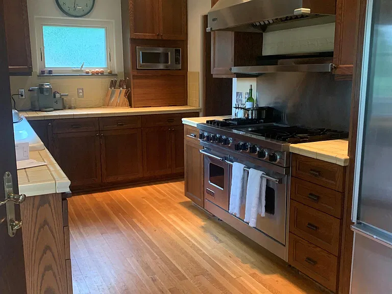 State of the art kitchen with double Viking stove, heating lights, subzero refrigerator, and double dishwasher.