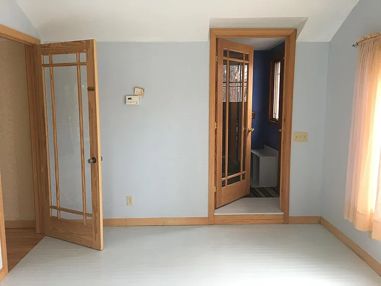 from end of studio looking toward mudroom, doorway to left is to north end bedroom