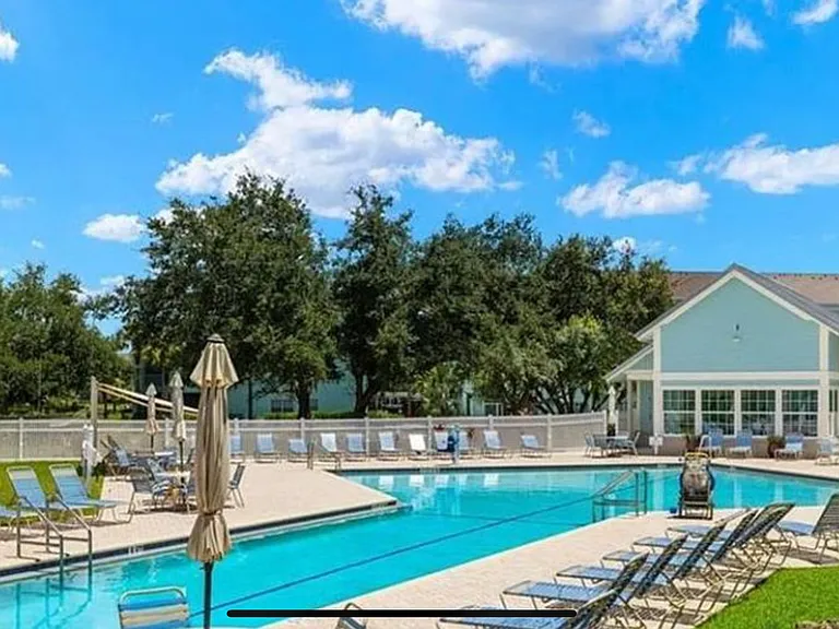 Heated swimming pool with clubhouse