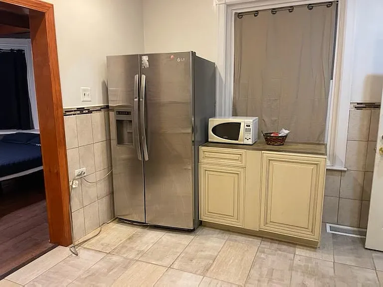 Refrigerator in kitchen