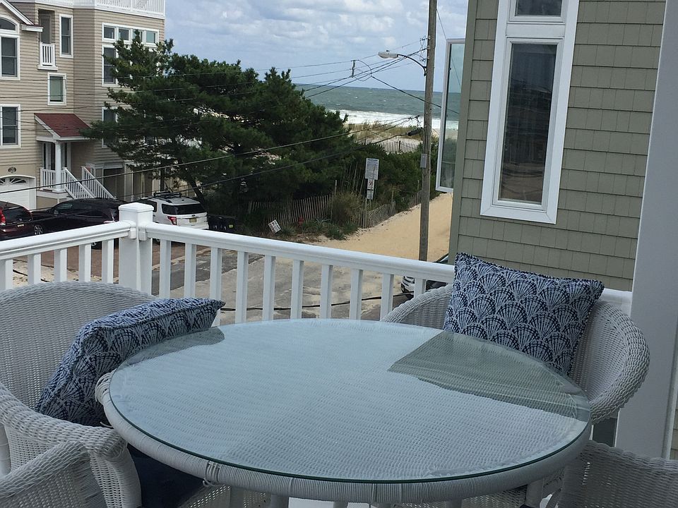 Deck with Polywood table and 4 swivel chairs.