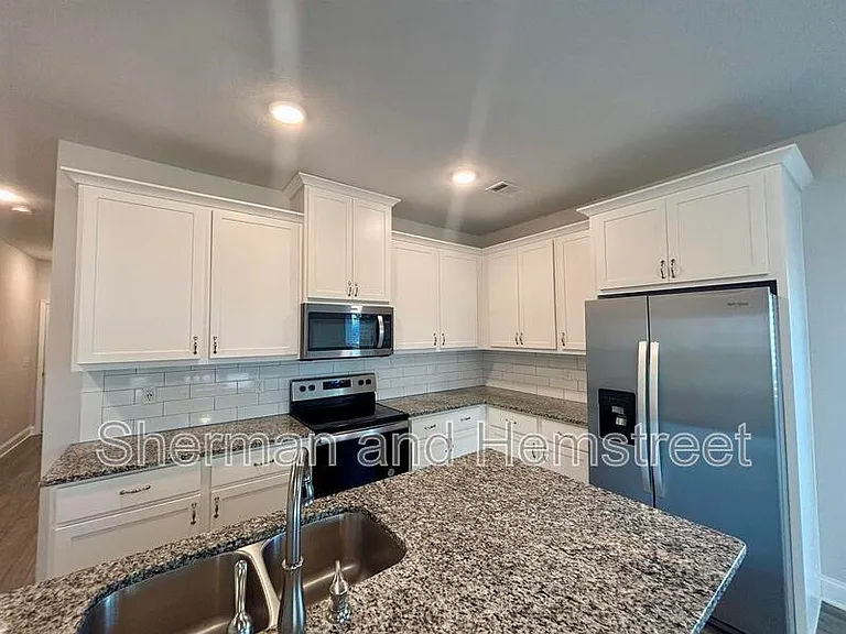 1101 Clareton Dr — Photo 3