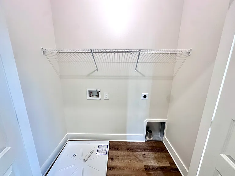 Laundry Area Centrally Located Near 4 Bedrooms
