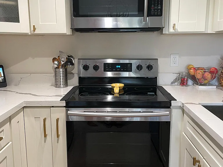 Recently renovated kitchen with modern appliances