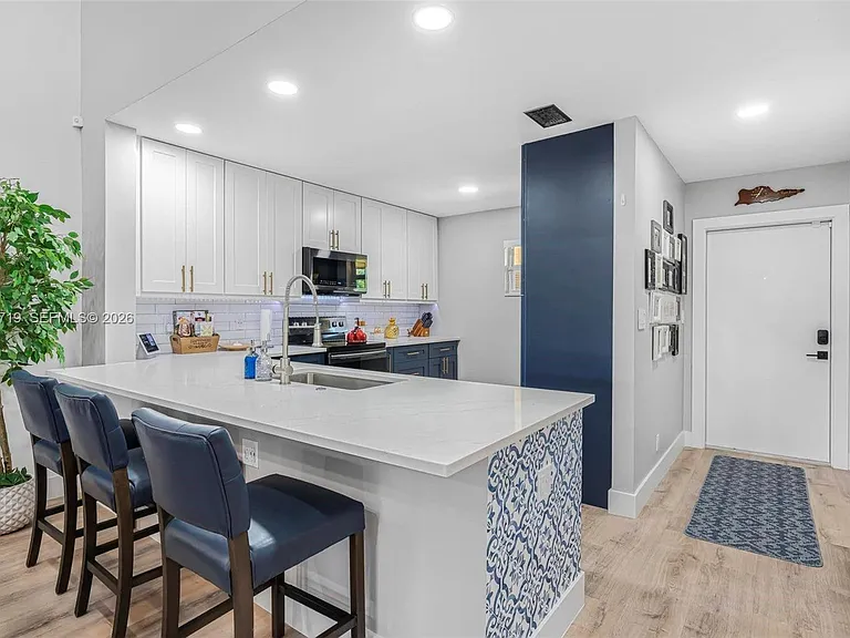 8770 Azalea Ct #203 — Photo 1