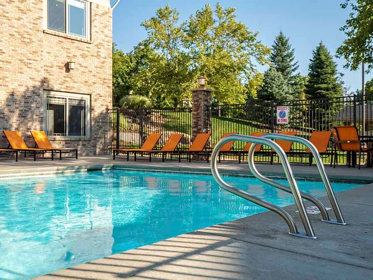 Relax and unwind by the swimming pool on sunny afternoons.