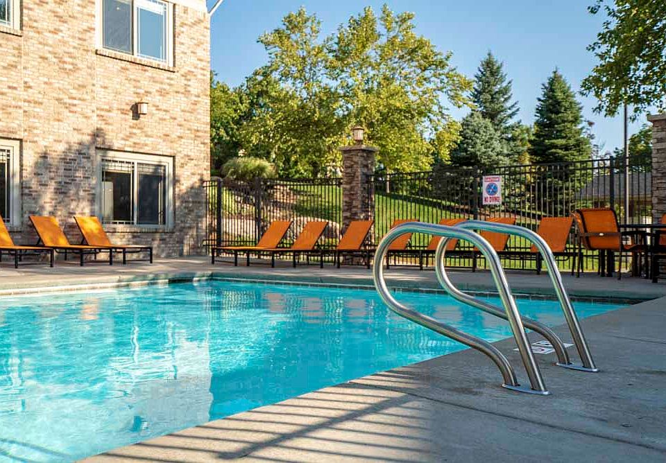 Relax and unwind by the swimming pool on sunny afternoons.