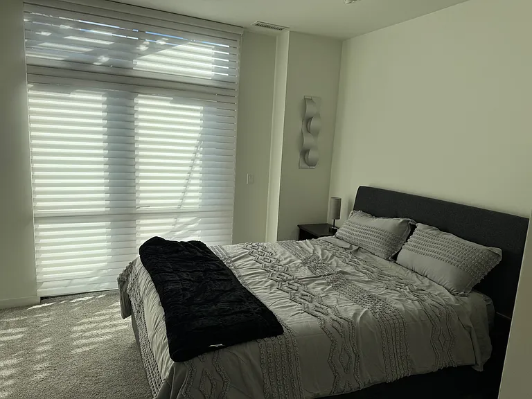 3rd bedroom - double bed and balcony.