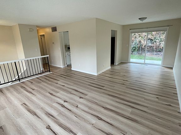 Dining room to right. Kitchen far with two entrances.