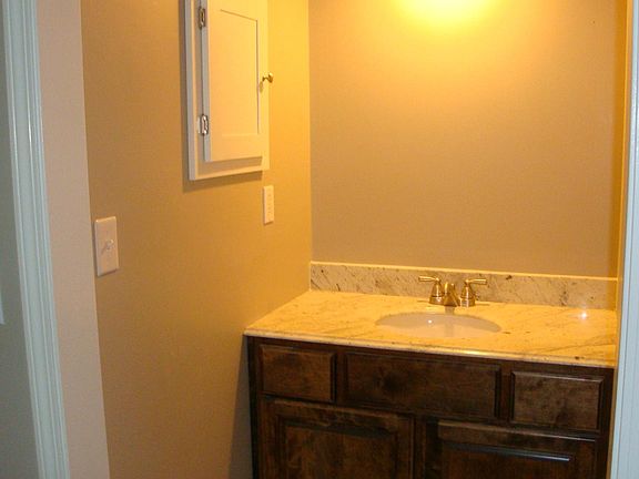 new tile, cabinets and granite counter in Master bath