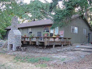 Exterior view of back deck w/fireplace