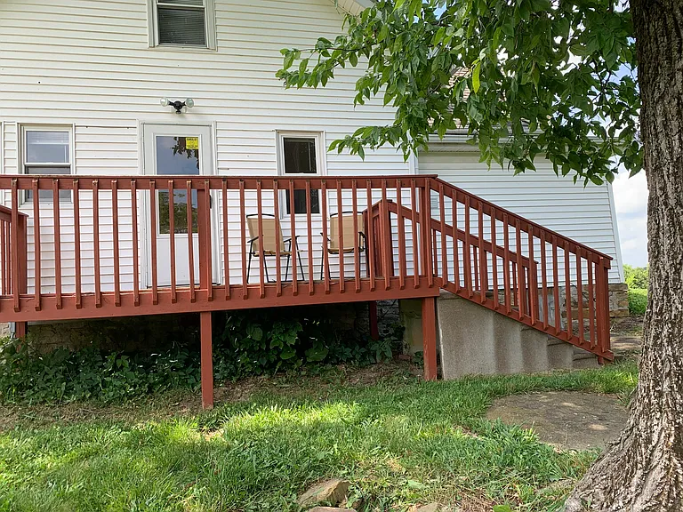 Shady backyard deck.