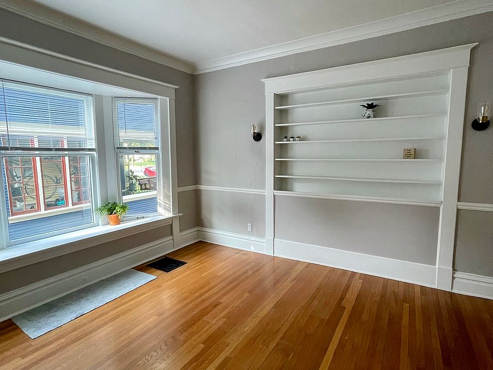 Large built-in shelving makes a perfect headboard