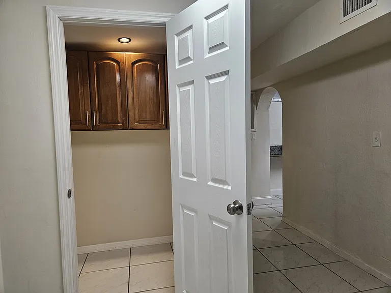 Walk-In Pantry with Cabinet Storage
