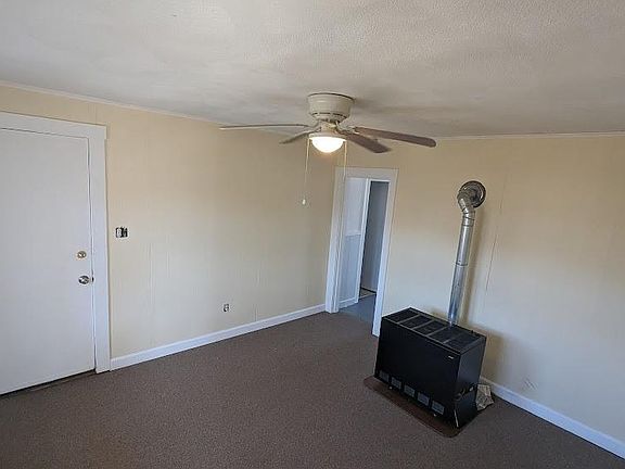 Entering living room from front bedroom