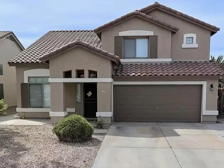 8609 W Vogel Ave — Photo 1