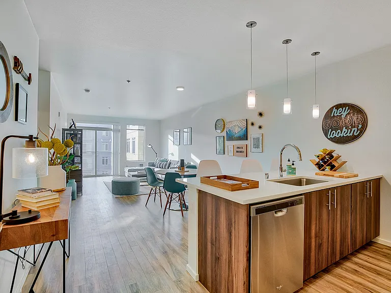 Spacious living and dining area filled with natural light