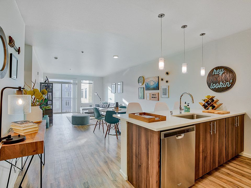 Spacious living and dining area filled with natural light