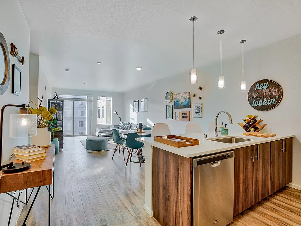 Spacious living and dining area filled with natural light