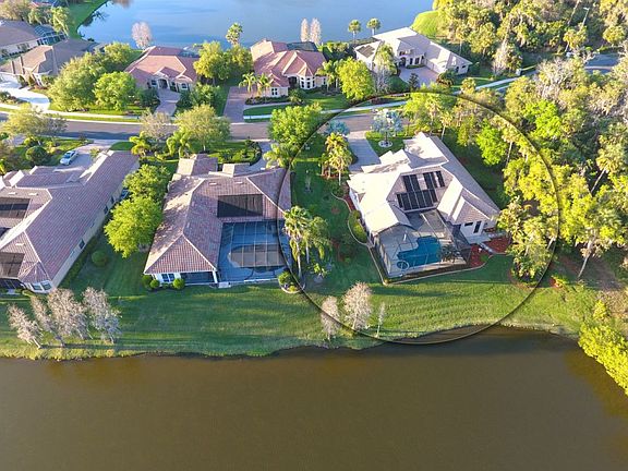Aerial view of house & lakes