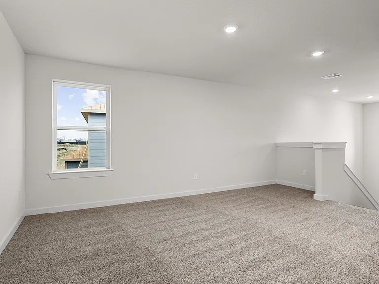The upstairs loft is a versatile space to make your own.