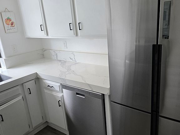 Stainless Steel Dishwasher and Refrigerator
