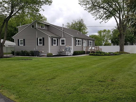 Large yard partially fenced