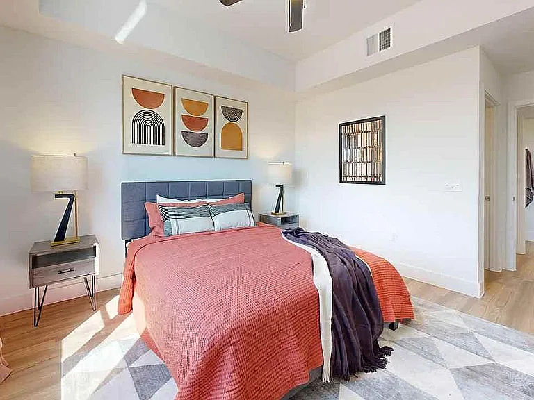 Experience serene comfort in this beautifully designed bedroom, perfect for relaxation.