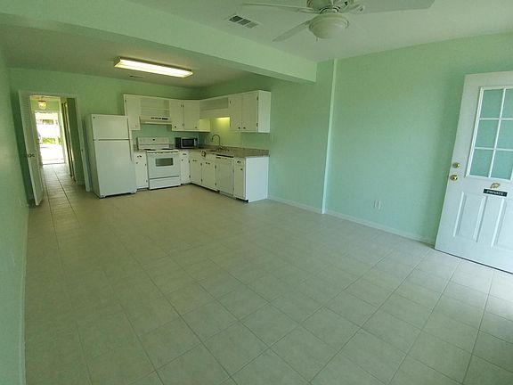 Kitchen Livingroom open floor plan. Lots of natural light!