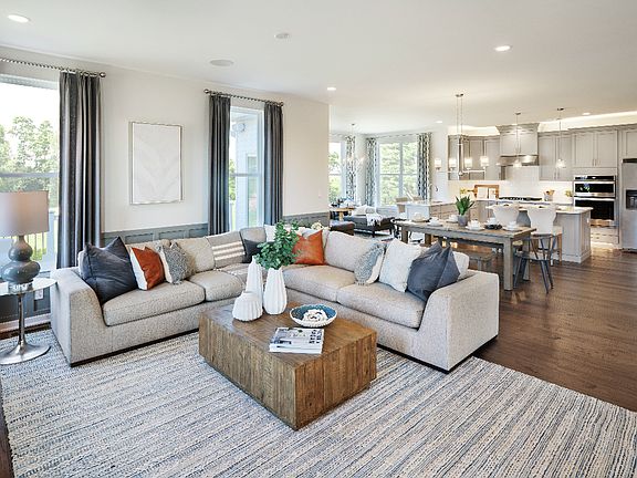 Kitchen opens to the breakfast area and family room