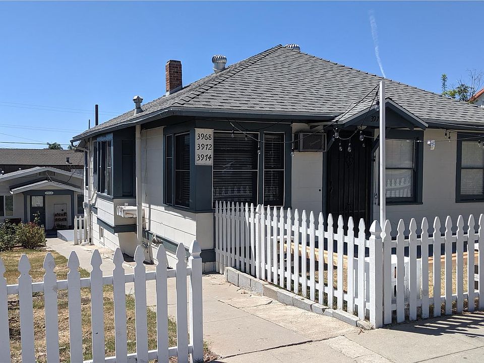 Property as viewed from street. Note 3974 is at the back of the property.