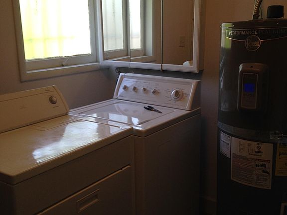 W/D with unit; door to backyard is in this room.
