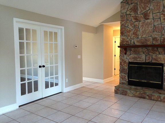 FIREPLACE AND FRENCH DOORS