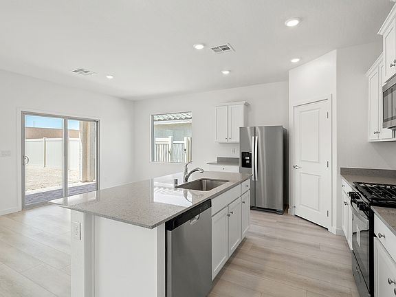 Natural light fills the living area creating a warm, inviting environment.