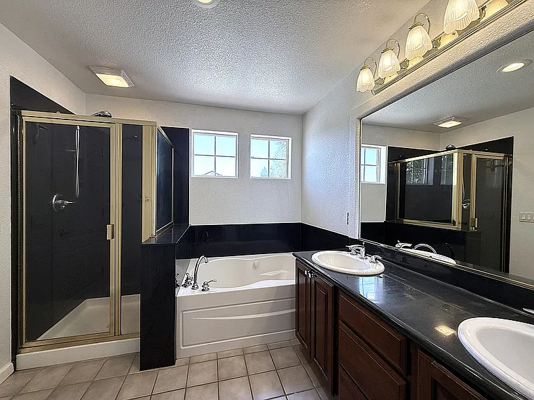 Primary Bathroom with Separate Shower and Bathtub