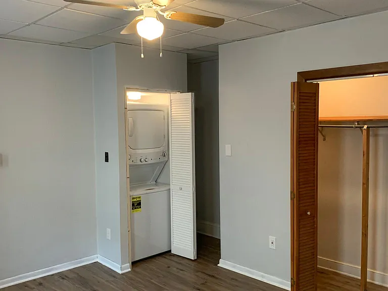 In-unit stacked washer and dryer